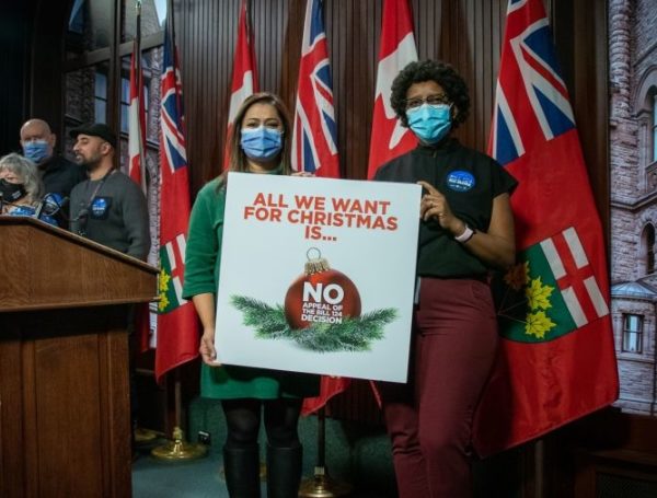 Ontario health care workers deliver “all we want for Christmas” card to Doug Ford